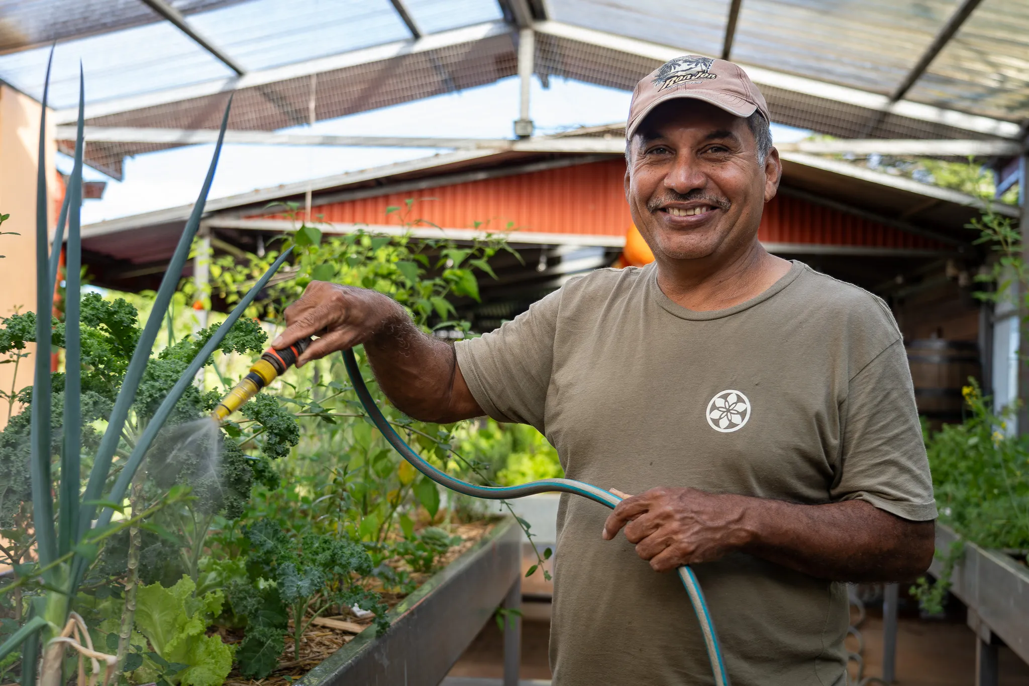 Farmer in the Hidden Valley Farm greenhouse