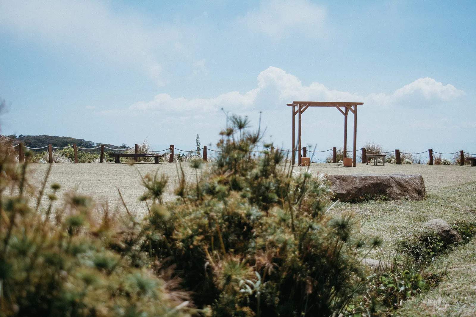 Here is a look at one of our wedding ceremony location options. This one is in front of Valle Escondido. There are beautiful mountain views beyond where the bride and groom will get married.