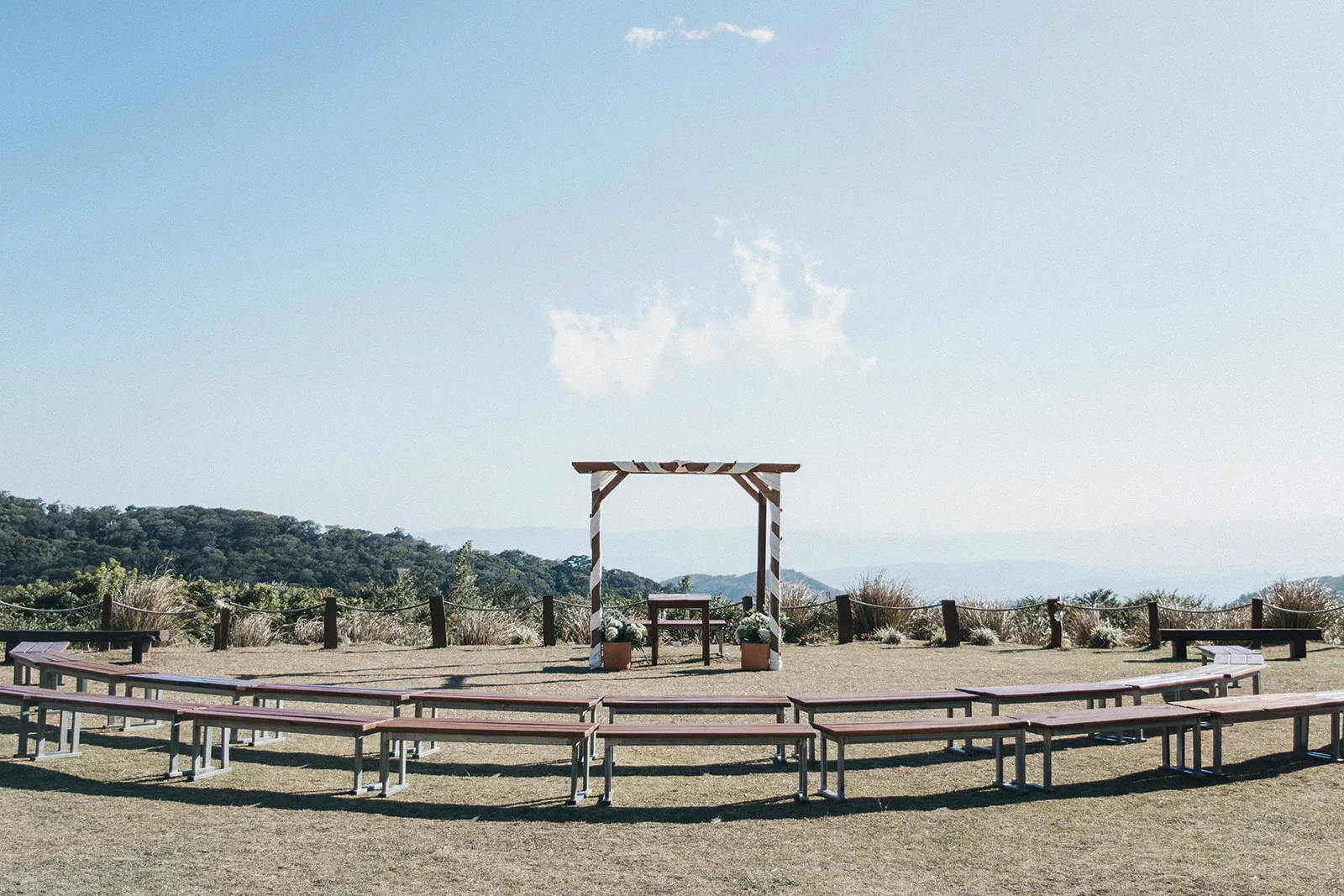 Here is a look at one of our wedding ceremony location options. This one is in front of Valle Escondido. There are beautiful mountain views beyond where the bride and groom will get married.